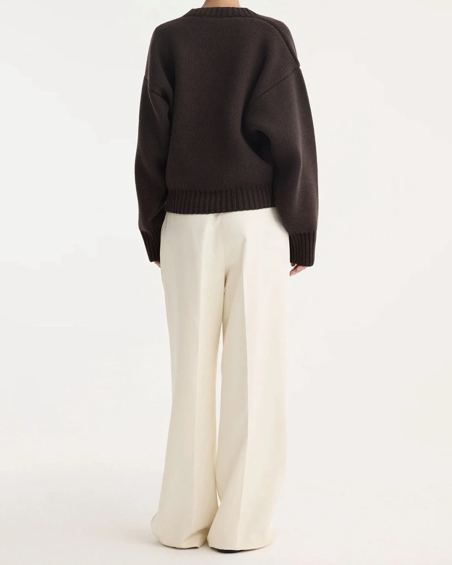 Sculptural compact v-neck